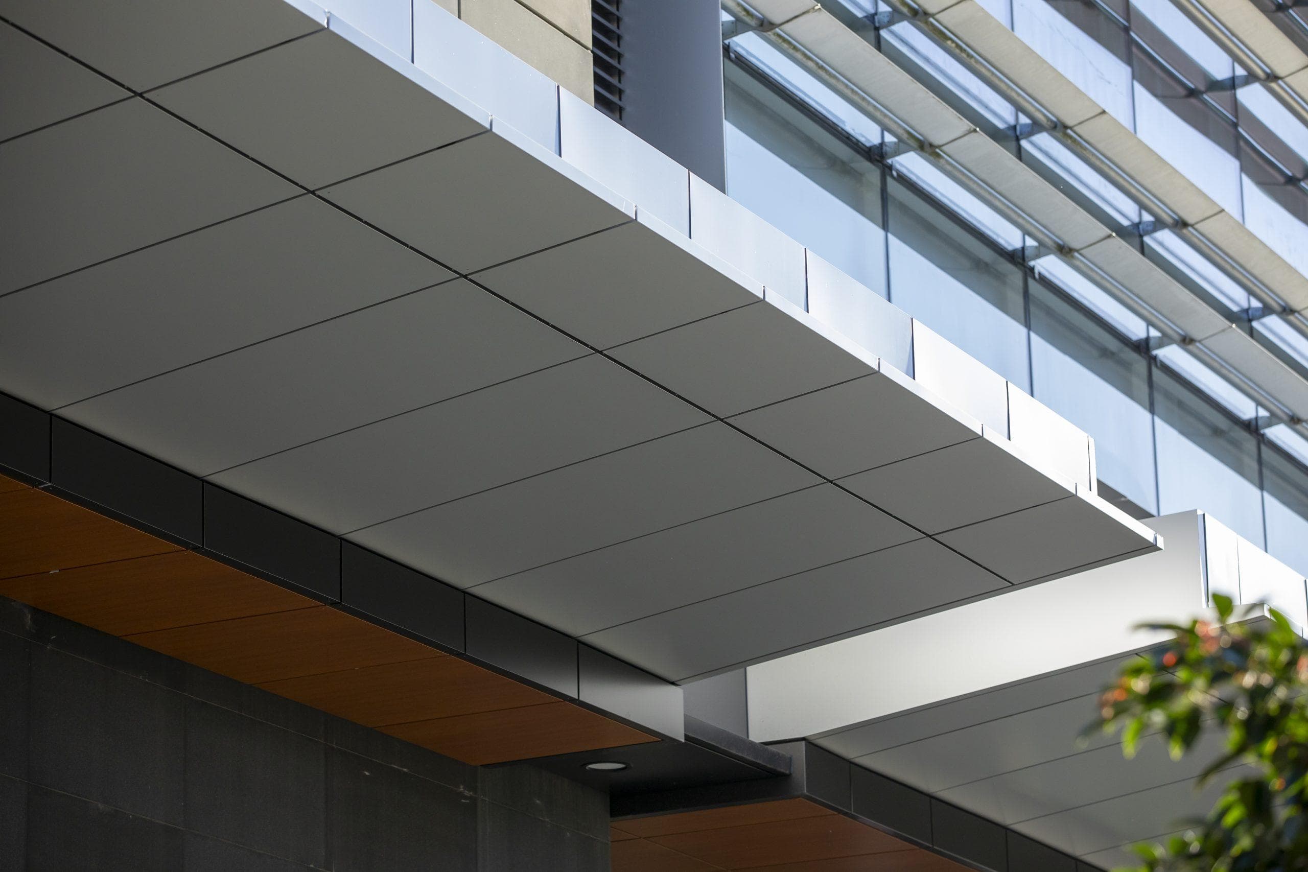 Modern façade of Charles Perkins Centre in NSW, showcasing sustainable architectural cladding.