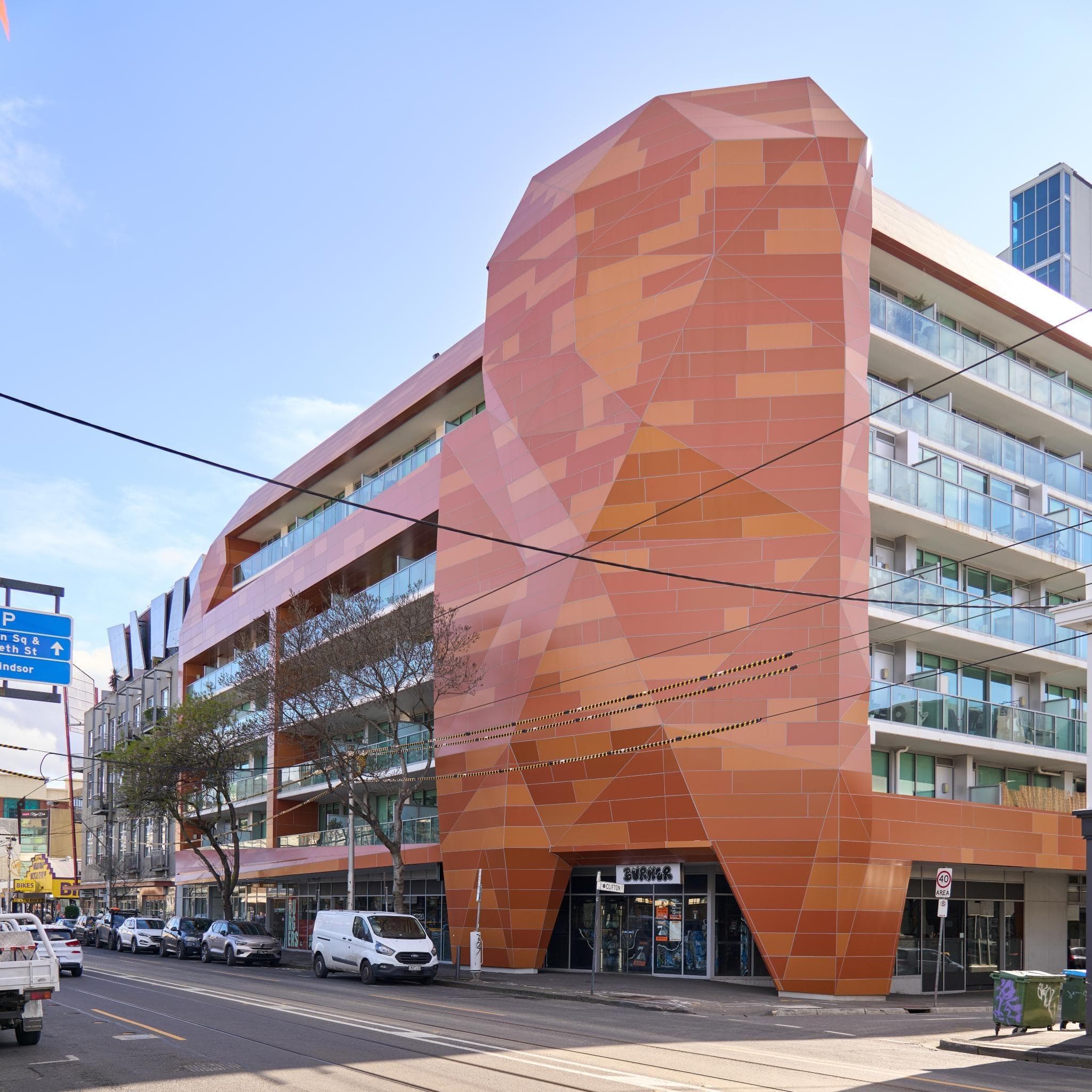 Trilogi Apartments Melbourne reclad with ALPOLIC™ DtS non-combustible aluminium panels in orange tones